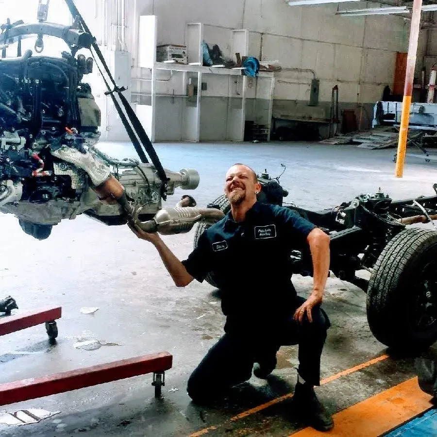 Steve Cox Mobile Mechanic lifting engine in Fallbrook CA